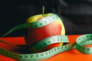 apple with tape measurement