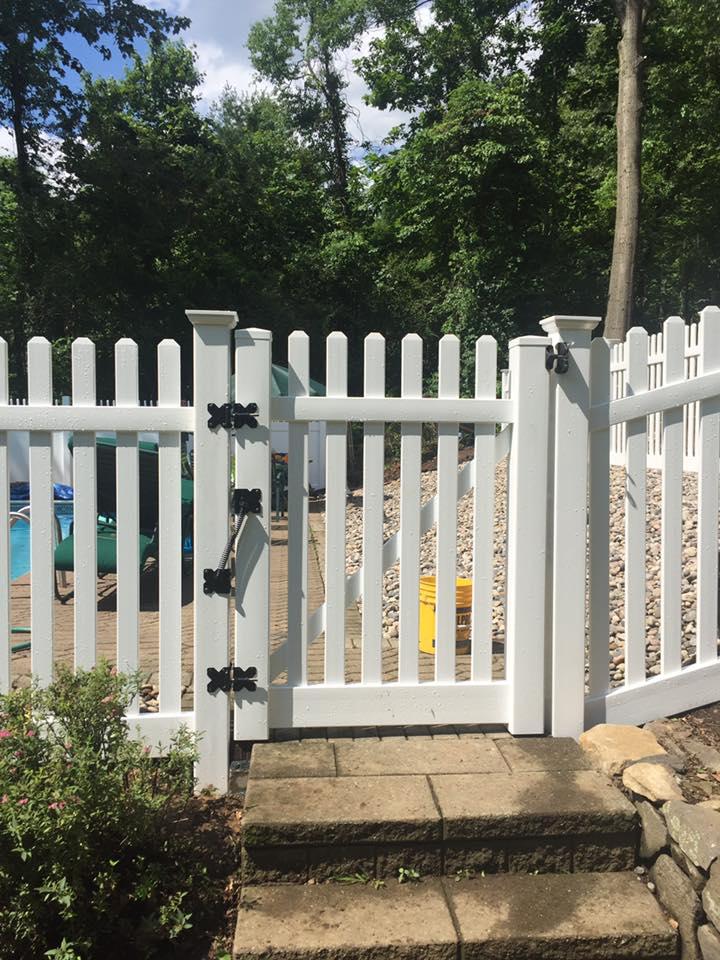 white fence around pool
