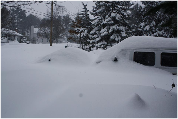 car-completly-under-snow