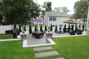 Unilock stone patio with landscaping